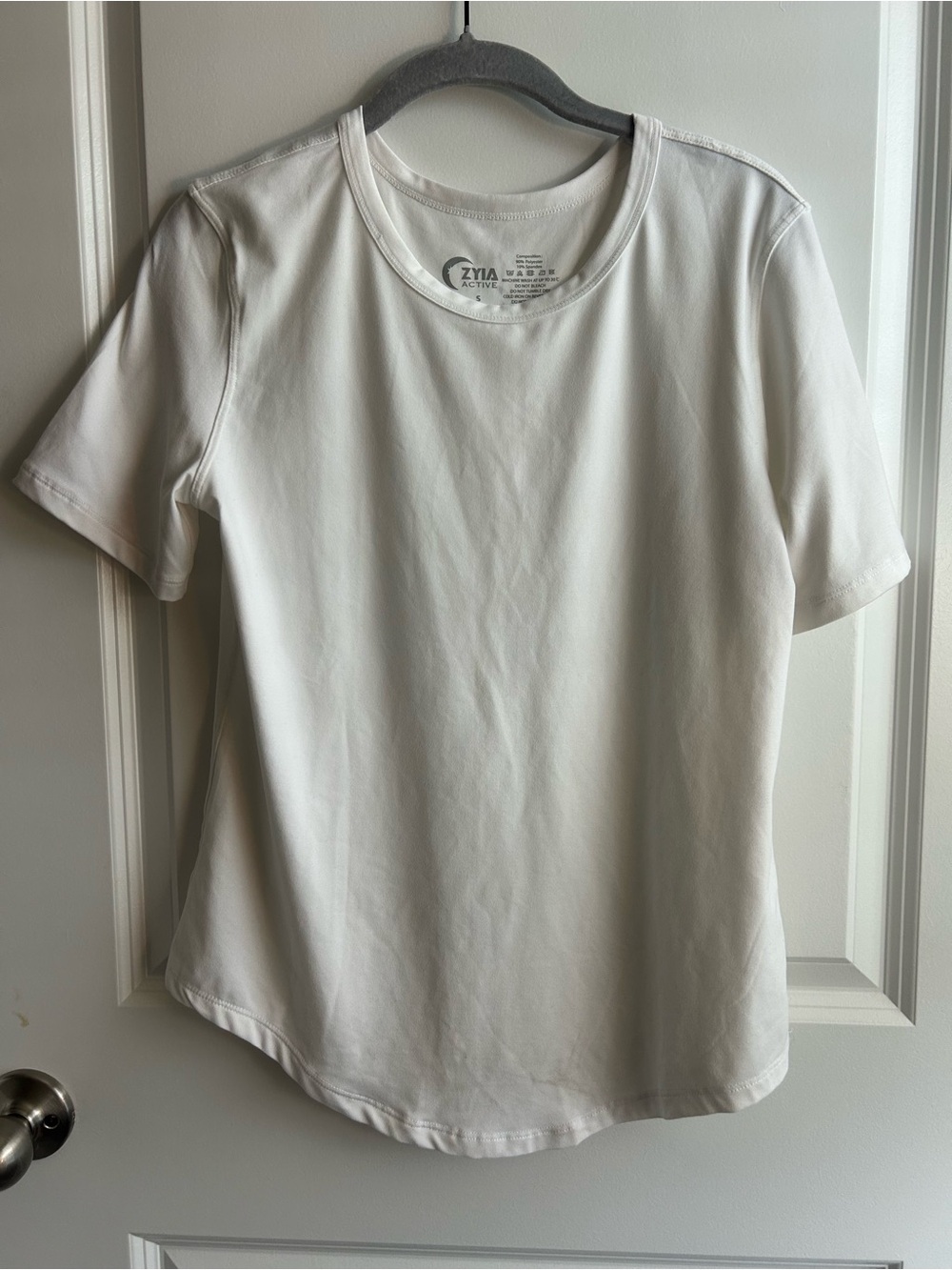 ZYIA White Performance V-Neck Tee